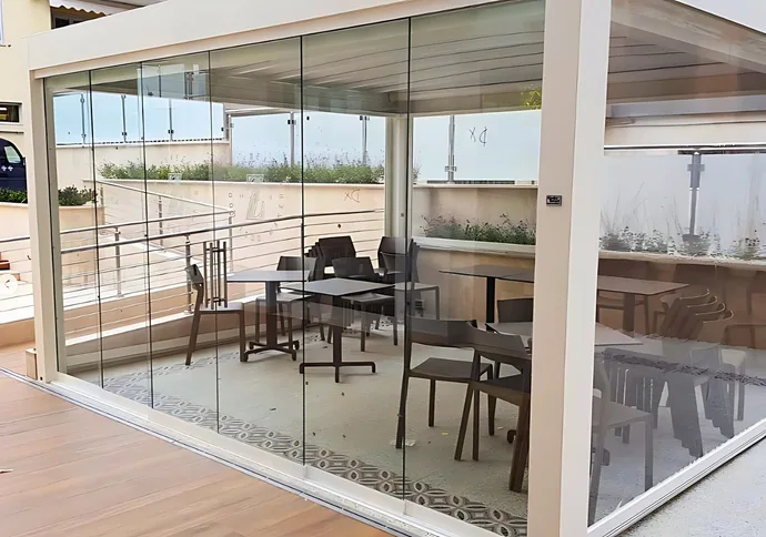 Commercial hospitality operable glass wall enclosure