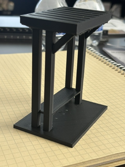 Scale model of the TB.1 single-sided court bench: 6 foot wide by 4 foot deep aluminum frame with a fixed-louver roof and composite slat seat.